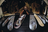 Picture of Michelle Lamy infront of her newly launched skateboard collection with THE SKATEROOM