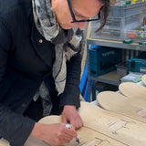 artist gregor hildebrandt signing his THE SKATEROOM skate art edition