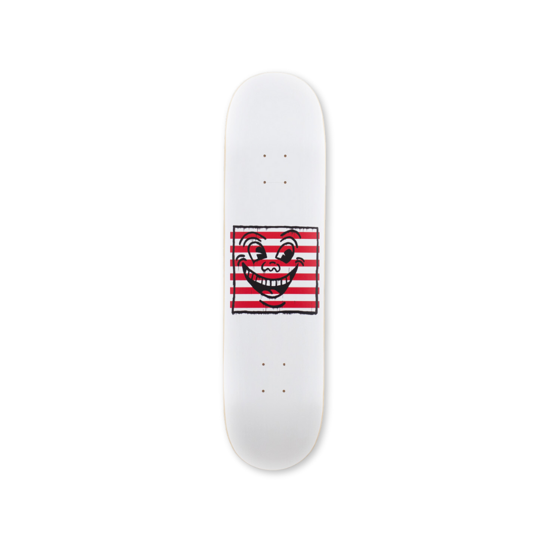 Keith Haring's Untitled (smile on stripes) skateboard art by the skateroom