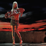 Model posing with Mowalola RED deck against dreamy background.