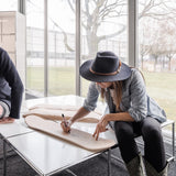 artist claudia comte signing her skate art edition by THE SKATEROOM