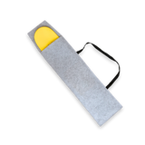 THE SKATEROOM medium felt bag with a skateboard partially visible inside, demonstrating secure fit and sleek design.