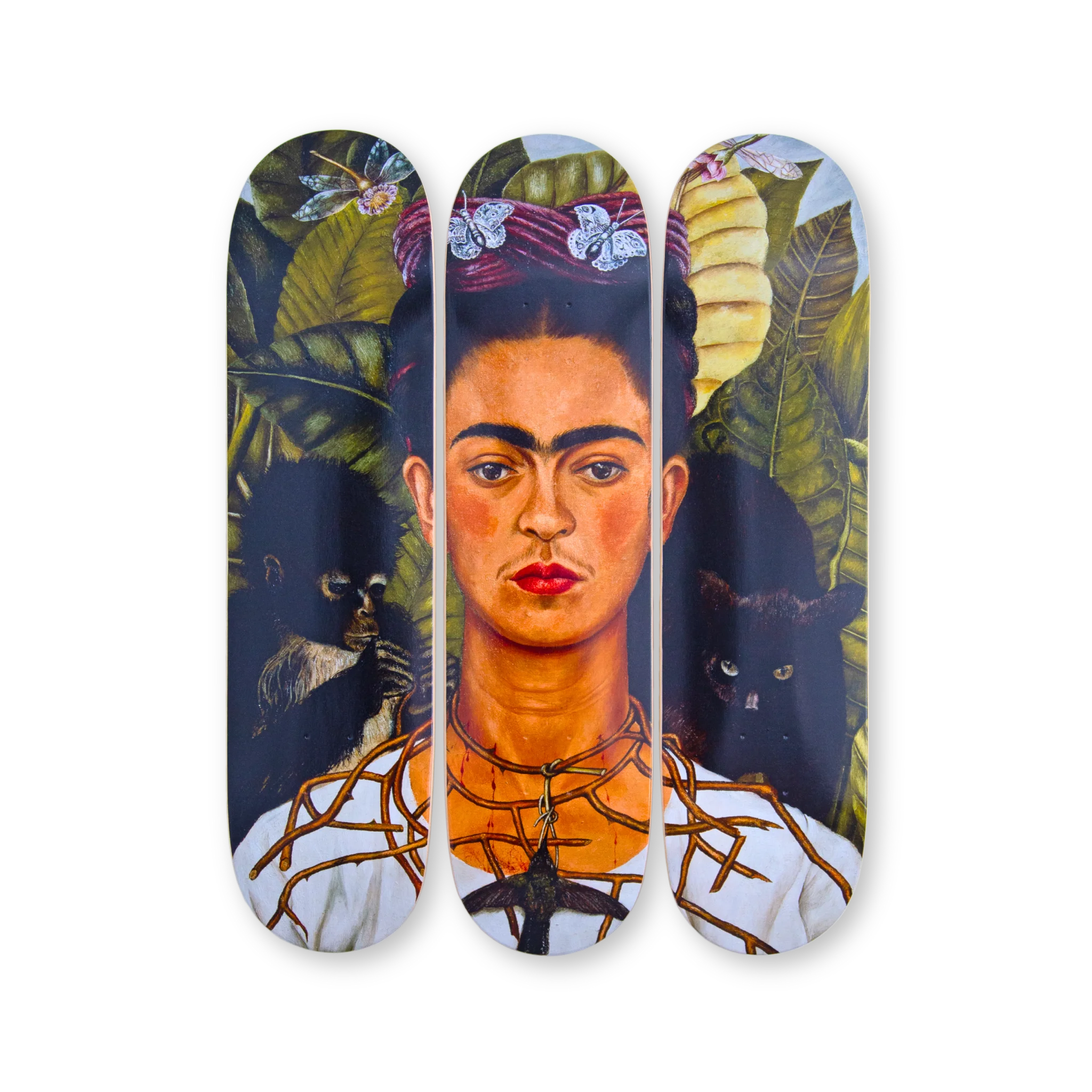 Frida Kahlo's 'Self-Portrait with Thorn Necklace and Hummingbird' reimagined on a triptych skateboard deck by THE SKATEROOM. Featuring Kahlo’s piercing gaze, a black cat, monkey, and lush botanical background, this edition captures her iconic symbolism and deep emotional expression.