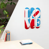 Robert Indiana's Great American Love skateboard art by the skateroom on the wall of an office