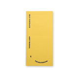 A yellow book titled 'Andy Warhol's Self-Portraits' by THE SKATEROOM.