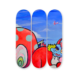 VEXX ‘The Life of the Party’ Original Triptych #2 featuring hand-painted skate decks with a surreal red polka-dot creature, cloudy blue sky, and a dragon-like character with yellow and blue accents.