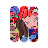 VEXX ‘The Life of the Party’ Original Triptych #5 featuring hand-painted skate decks with a surreal girl’s face, multicolored eyes, red hair, and playful tongue-out expression, surrounded by abstract forms and bold outlines.