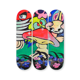 VEXX ‘The Life of the Party’ Original Triptych #9 featuring hand-painted skate decks with a large red mushroom, wide-eyed characters, and vibrant flowers set against a green grass background.