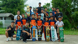 SATI non profit organization with group of children with skateboards