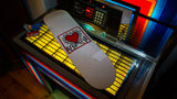 the skateroom keith haring heart art edition displayed on jukebox