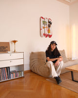 Influencer SI.LEN.CIO portait in her living room showcasing her interior design statement pieces