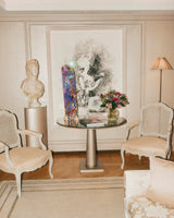 Skate deck on a display stand.