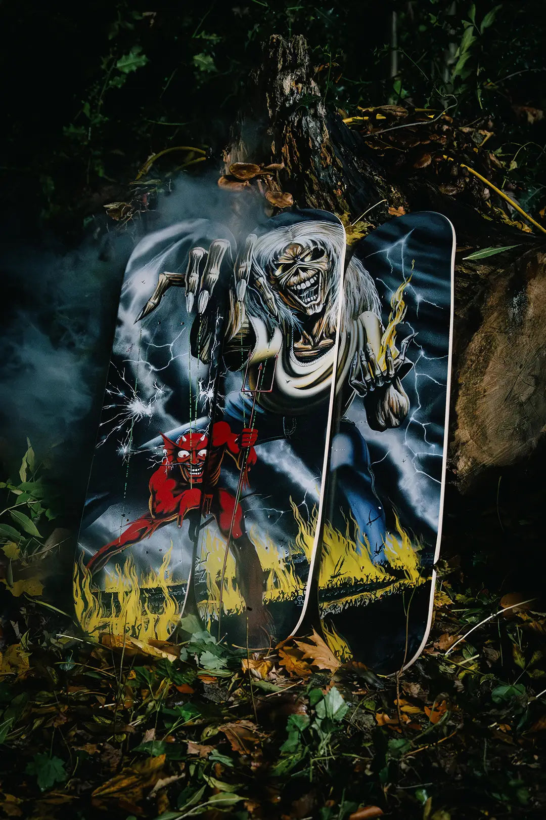The Number of The Beast skate triptych by Iron Maiden in a spooky, foggy forest scenery at night.