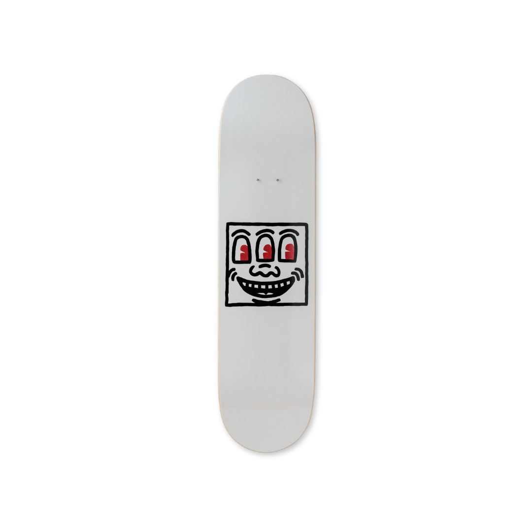 Keith Haring's Untitled (smile) skateboard art by the skateroom
