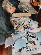 Artist and graphic designer David Carson hand signing limited editions skate decks made by the skateroom.