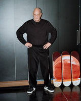 Belgian artist Luc Tuymans standing next to his limited edition skate triptych Eternity.