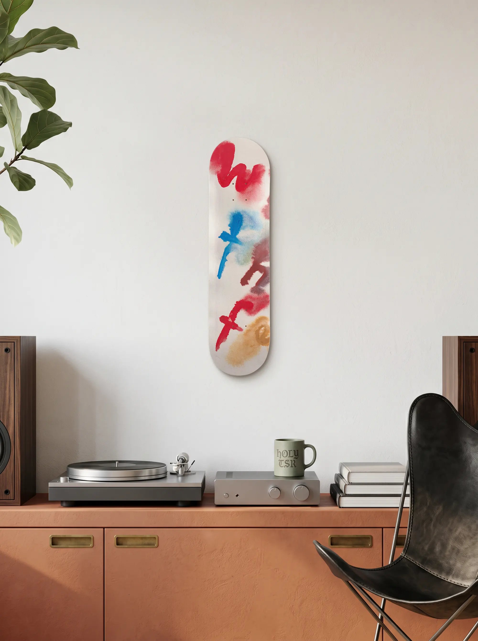 Beni Bischof What The Fuck art skateboard by The Skateroom displayed on a wall in a contemporary interior