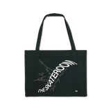 THE SKATEROOM Cabas Bag – Black eco-friendly tote bag with white graphic design, made from recycled cotton and polyester. Durable, spacious, and perfect for daily essentials.