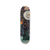 Limited-edition skateboard deck featuring 'Good Night New York' by Raymond Pettibon and Marcel Dzama. The artwork depicts a surreal nighttime scene with the Statue of Liberty emerging from water, holding a flaming torch, beneath a whimsical moon with a human-like face and swirling golden stars. Part of THE SKATEROOM’s exclusive collaboration with the artists.