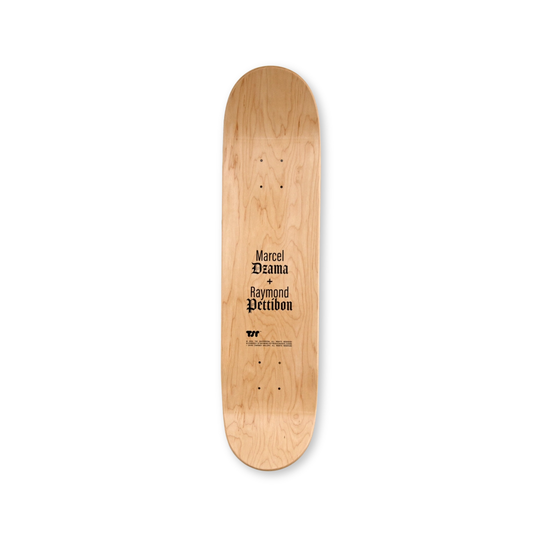 Back of a limited-edition skateboard deck from THE SKATEROOM, featuring the collaborative work of Marcel Dzama and Raymond Pettibon. The natural wood grain is visible, with the artists' names printed in a gothic-style black font. Below, THE SKATEROOM’s logo and edition details are subtly engraved, marking this as a collectible art piece.