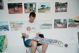 Jean Jullien hand-signing The Republic art skateboard deck for The Skateroom — each edition individually signed by the artist