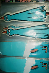 Jean Jullien Cooking art skateboard by The Skateroom, lifestyle photography showing deck in a styled urban setting