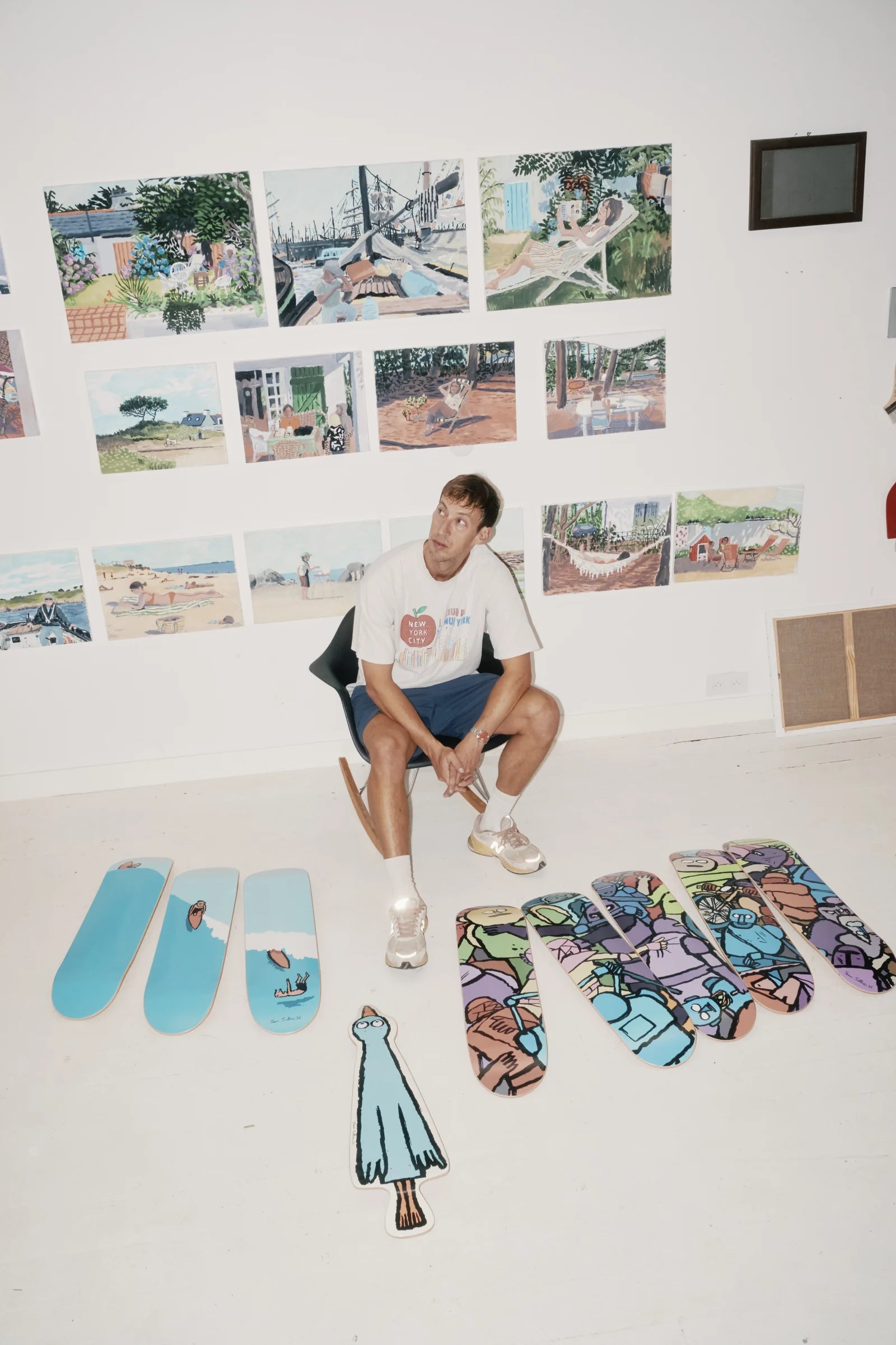 Jean Jullien Cooking art skateboards by The Skateroom arranged on the ground, lifestyle overhead shot