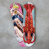 Jeff Koons 2025 Lobster and Seated Ballerina Skateboards side by side on concrete floor. Time-limited art deck release by THE SKATEROOM.