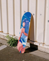 Vitamin Thunder art skateboard by Little Thunder leaning against a white corrugated wall