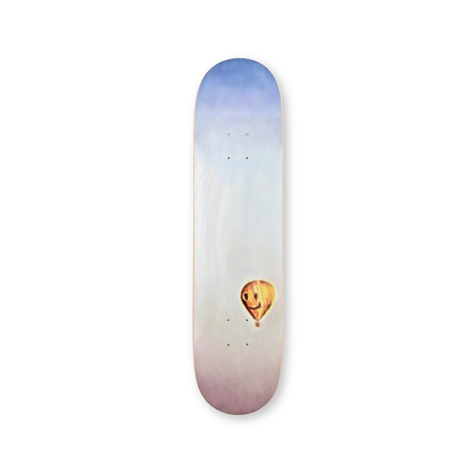 Skateboard deck with a gradient design and a small graphic of a dog in a hot air balloon, artwork by artist Luc Tuymans.