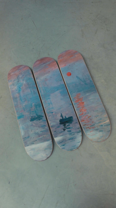 Detail and angles of the Impression Soleil Levant triptych of skate decks by Claude Monet and THE SKATEROOM.