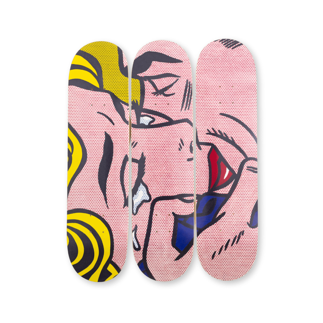Roy Lichtenstein 'Kiss V' skateboard triptych by THE SKATEROOM, featuring vibrant comic-inspired art across three skate decks, perfect for wall display or art collectors.