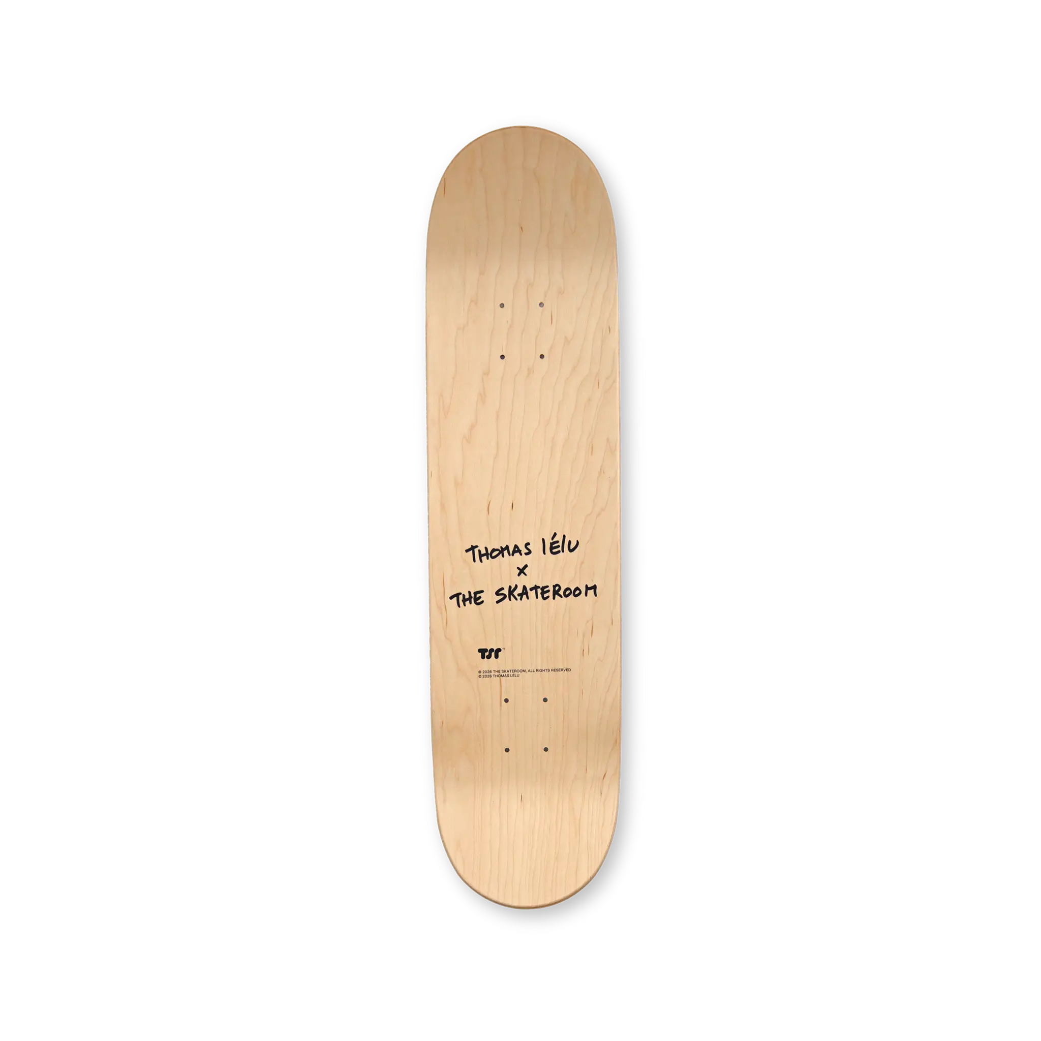 Skateboard deck with 'Thomas Lélu x The Skateroom' branding on a veneer background