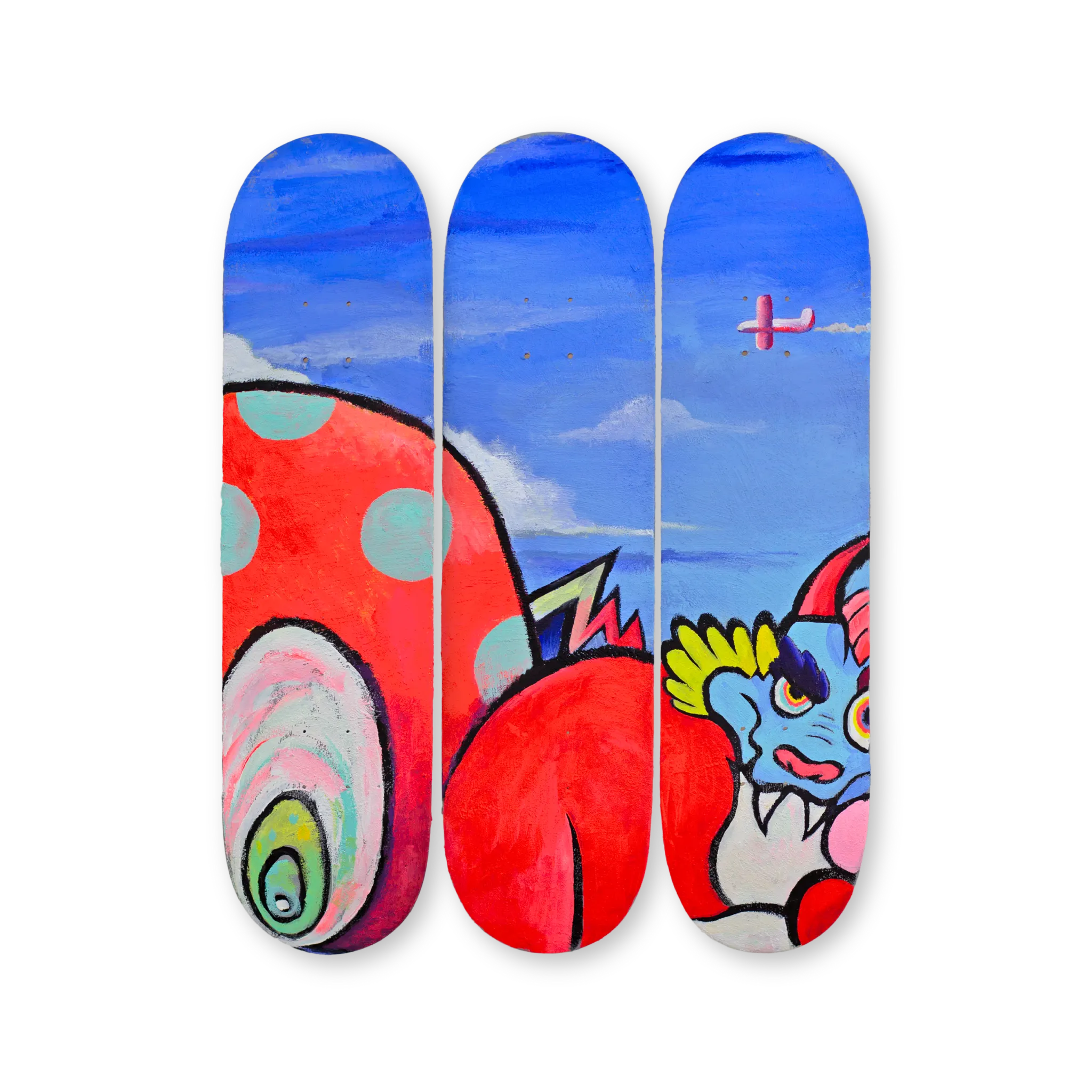 VEXX ‘The Life of the Party’ Original Triptych #2 featuring hand-painted skate decks with a surreal red polka-dot creature, cloudy blue sky, and a dragon-like character with yellow and blue accents.